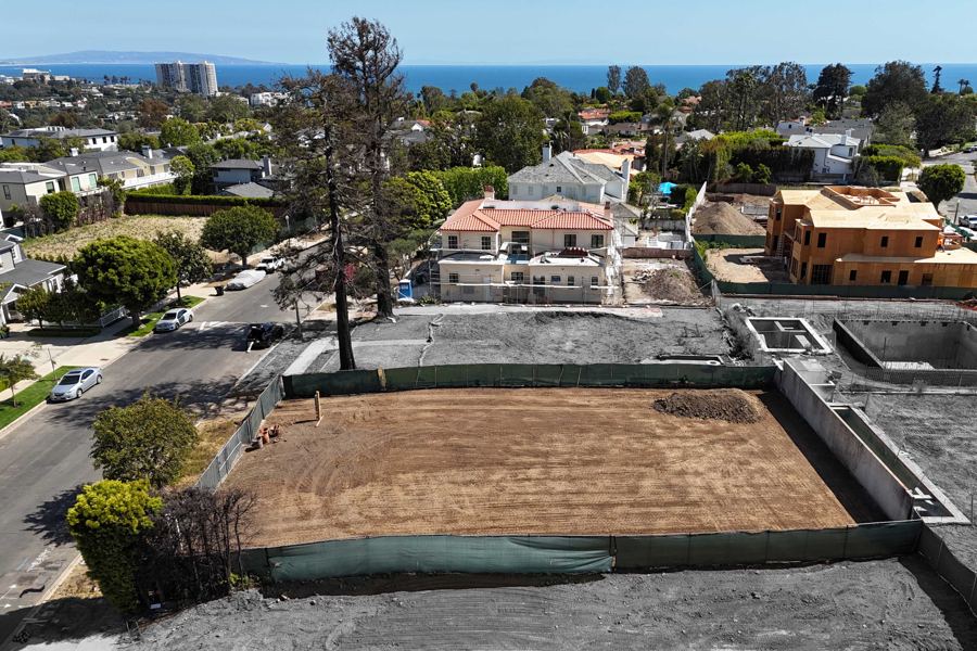 Aerial of Ocampo Drive with rebuilds underway on neighboring lots